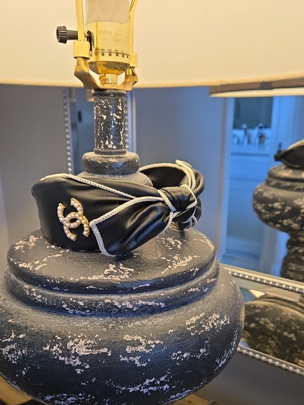 Unique Blk Padded Headband with Gold-Tone CC Pearl Logo